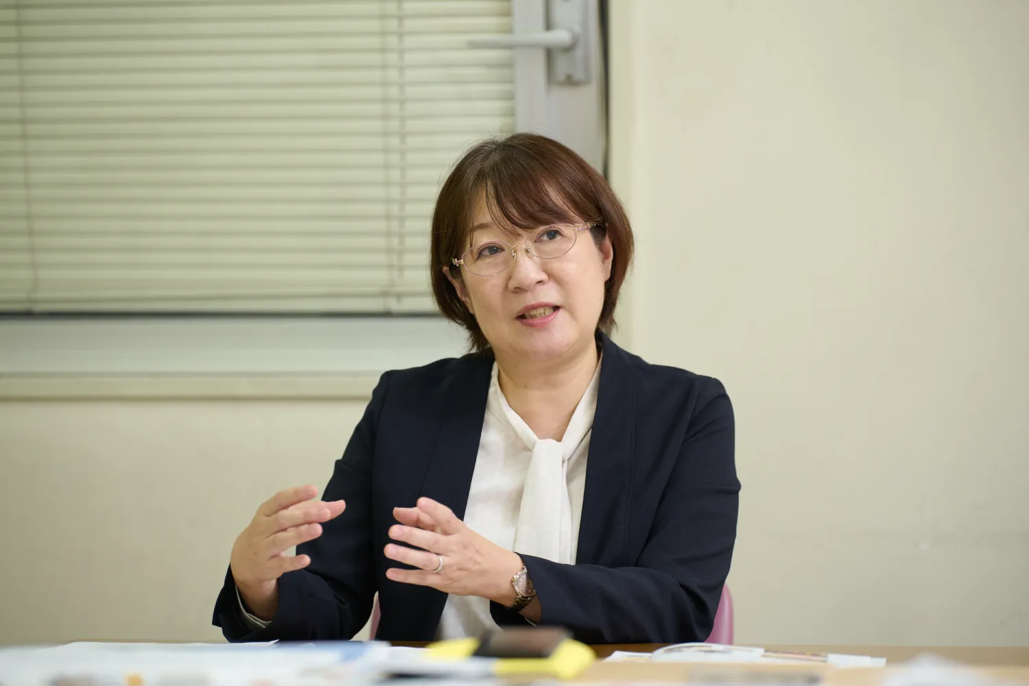 区内企業や区民一人一人の思いやりの心が大きな支援につながっている、と語る関根さん